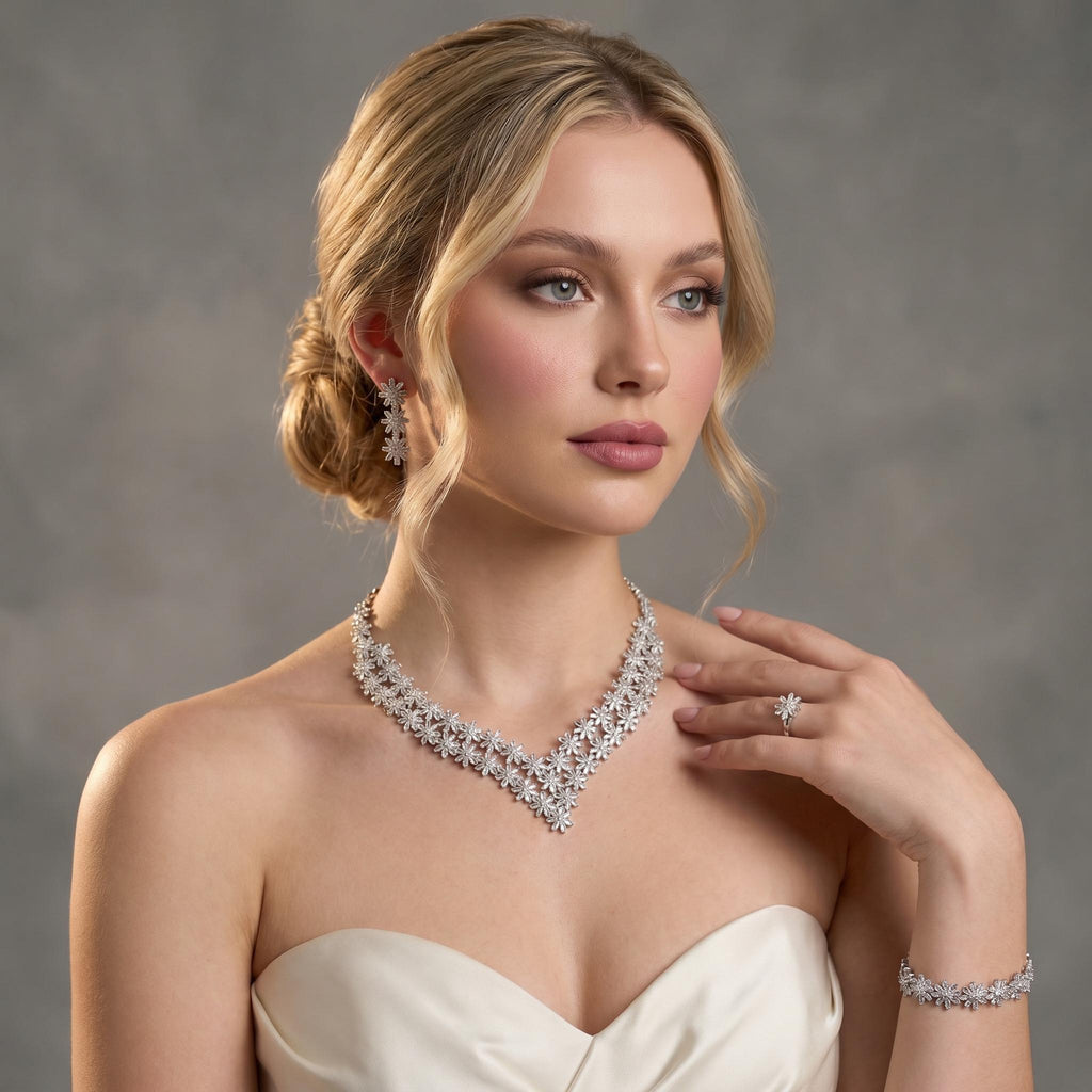Bride wearing a silver floral crystal jewelry set with double-layer V necklace, earrings, bracelet and ring