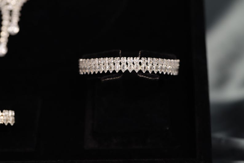 Silver cubic zirconia bridal bracelet with refined crystal line design